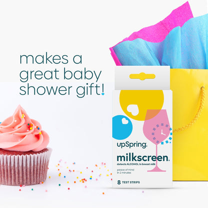 A cupcake and gift bag with a box of milkscreen make good baby shower gifts